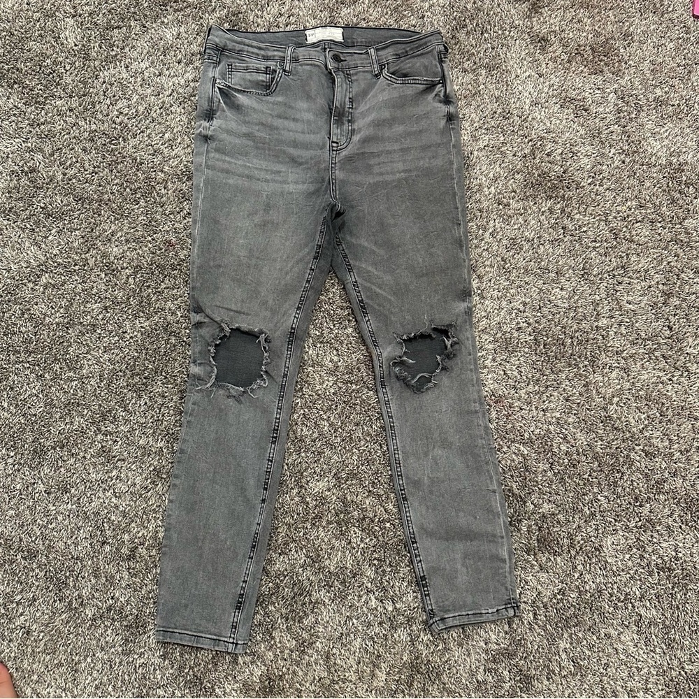 Free People black/grey wash jeans size 31 wholes in knees